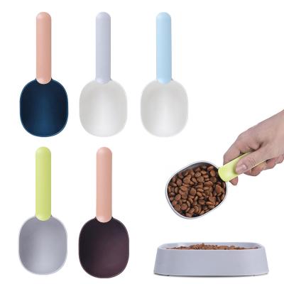 China New Design Sustainable Pet Feeding Spoon Food Grade Plastic Clip Cat Food Spoon With Seal Dog Food Shovel for sale