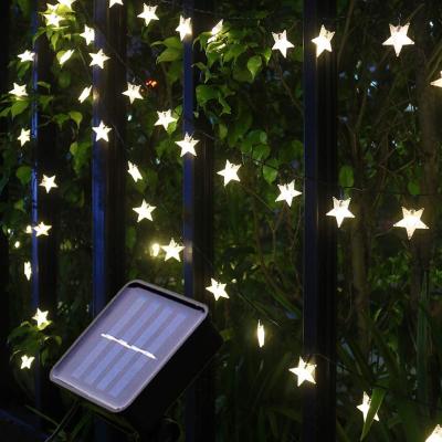 China Outdoor Star Shaped Twinkle 30LED Solar Powered Fairy Garden String Lights For Garden Patio Lawn Fence for sale