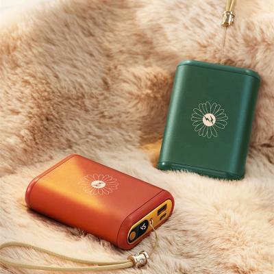 China 10000 New Arrivals New Arrivals MAH Hand Sunshine Hotel Portable Metal Power Bank Warmers Metal Rechargeable OEM Logo Customization for sale