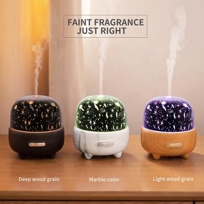 China New Model Outdoor Projection Lighting Starry Sky Spa Aromatherapy Diffuser Air Humidifiers OEM Color Customization for sale