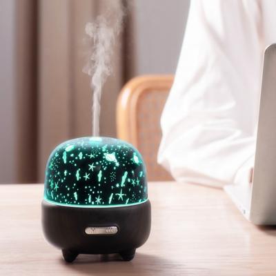 China New Model Filtered Light Slides Outdoor Starry Sky Yoga Spa Aromatherapy Diffuser Air Humidifiers OEM Diffusores Color Customization for sale