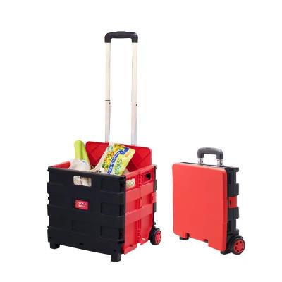 China Hand Supermarket Trolley Mini Shopping Trolley Plastic Rolling Collapsible Folding Shopping Trolley for sale