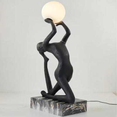 China Nordic contemporary figure sculpture holding ball floor lights shopping mall hotel villa living room designer decorative art ornaments lights for sale