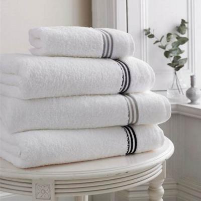 China Compressed Durable Absorbent White Cotton Hotel Bathroom Spa Shower Pool Thick Hand Towel for sale