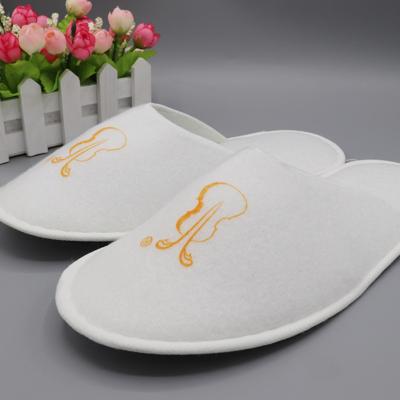 China Fashion Trend Customized Disposable Embroidered Hotel Terry Slippers For Sale for sale