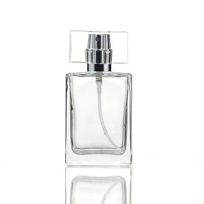 China Customized Viable/Eco-Friendly/Stocked 35ml Rectangle Empty Empty Clear Perfume Bottle With Plastic Cap Sprayer Atomizer And Mist Pump for sale