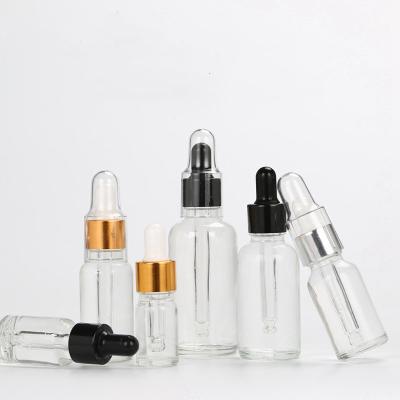 China Viable/Eco-friendly/Stocked High Quality Essential Oil Empty Clear Glass Bottle Cylinder Perfume Serum Oil Dropper Bottle With Dropper Cap for sale