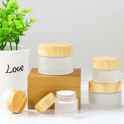 China 5ml 10ml 15ml Glass Bottle Viable/Stocked Cosmetic Container Frosted Clear Glass Jars Eye Face Skin Care Cream Cream Packaging With Bamboo Lids for sale