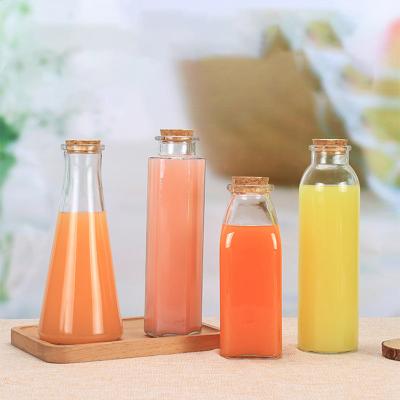 China Single Viable/Eco-Friendly/Stocked Food Grade Beverage Bottle Glas Milk Wine Tea Vodka Liquor Juice Spirit Cold Coffee DrinkingGlass Clear Bottle For Sale for sale