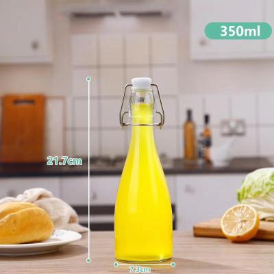 China Sustainable / Eco-friendly / Stocked Various Capaity Round Or Square 1Liter Glass Beverage Bottles For Liquor Drinking Wine Juice Packing Glass Bottle With Swing Top for sale