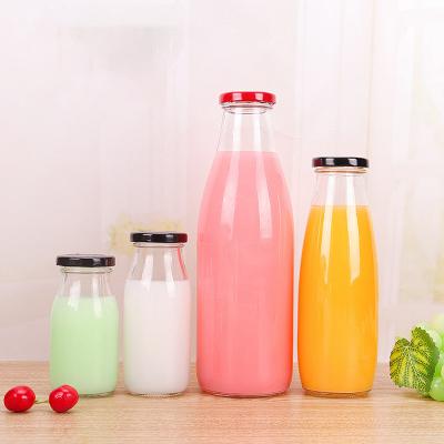 China Custom Sustainable/Eco-friendly/Stocked Clear Glass Empty Glass Milk Bottle Logo 200ml 250ml 500ml 1liter Bottle For Milk Juice Beverage Drinking With Metal Lid for sale