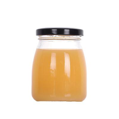 China Wholesale 100ml 150ml 200ml Sustainable/Eco-friendly/Stocked Glass Pudding Bottle YogurtJam Jar Honey Jelly Glass Packing Storage Mini Milk Bottle With Lid for sale