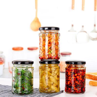 China Price 200ml Cheap Heatable Clear Glass Food Jam Jar PickleJar Glass Bottle Packaging Empty Glass Jars For Honey Bottle With Metal Cap for sale