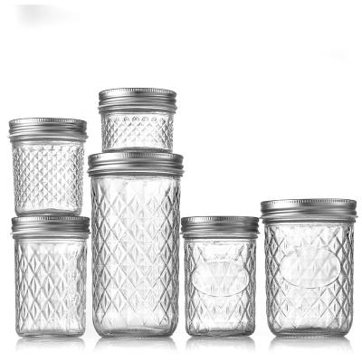 China Heatable in Stock Mason Jar Honey Pickle Canning Baby Food Packaging Storage Container Glass Jar Wholesale with Metal Lids for sale