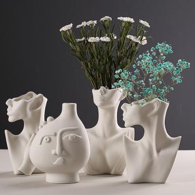 China Simple Modern Simple Abstract Face Sculpture Human Body Ceramic Dry Flower Vase For Living Room Office Decoration Creative Nordic for sale