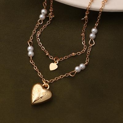 China Wholesale 2 Layered Pearl Necklace Double Heart Shape Pendant Necklace TRENDY Jewelry Clavicle Chain Chain for sale