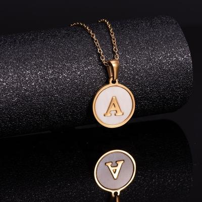 China Classic Female Titanium Steel 26 English Capital Letter Pendant Jewelry Shell Stainless Steel Round 18K Gold Letter Necklace for sale