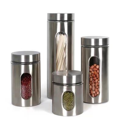 China 4 Piece Silver Round Stocked Brushed Stainless Steel Storage Jar And Glass Canisters Jars With Window With Metal Lid for sale