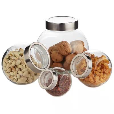 China Hot Sale Drum Shape Flat Clear Food Storage Stocked Jar 50ml Candy Glass Jar Spices Jar for sale