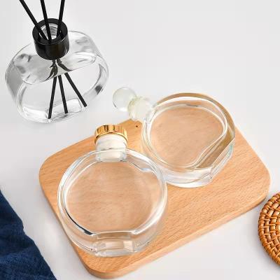 China 40ml 65ml 80ml Empty Round Aromatherapy Cosmetic Reed Diffuser Glass Bottle Decorative for sale