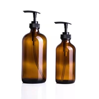 China Personal Care Manufacturers 250ml 500ml 16oz Clear Matt Black Amber Boston Round Pump Glass Bottle For Shampoo for sale