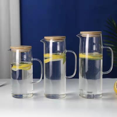 China 1000ml Tea And Coffee Stocked Glass Jar Jugs With Bamboo Lid for sale