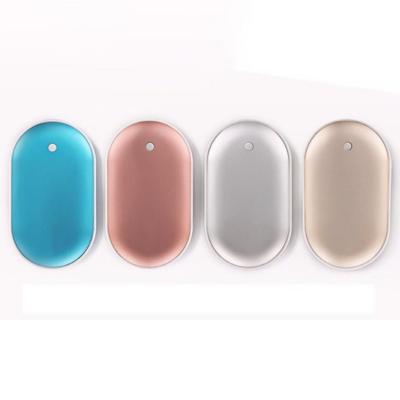 China Mini Pocket Size Portable Hand Warmer Winter Gifts Mini Hand Warmers Rechargeable Reusable with Power Bank for sale