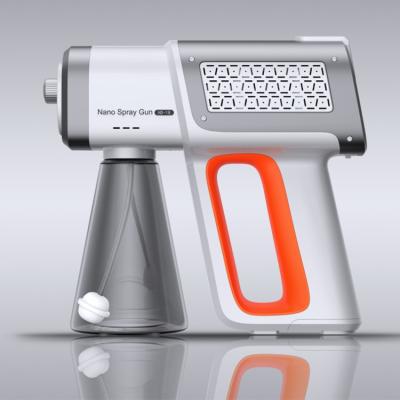 China Mini Blue Ray Atomizer Disinfecting Gun Household Rechargeable Washing Portable Radio Spray Nano Spray Gun for sale