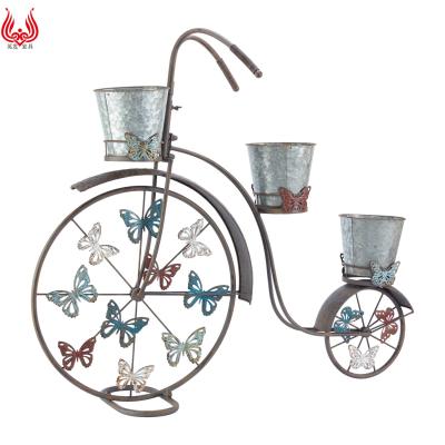 China YINFA Modern Hot Metal Garden Metal Wire Decorative Planter Flower Pot Holder Standing Plant Pot With Butterfly Decor for sale