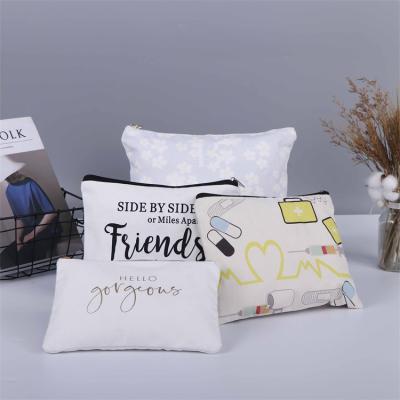 China Organic Custom Simple Canvas Fabric Zipper Fashion Logo Eco Cotton Makeup Bag Cosmetic Bag for sale