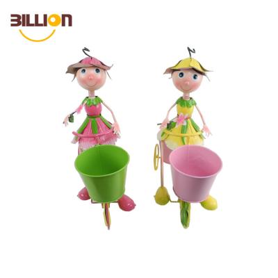 China Economic Bicycle Flower Planter Metal Couple Girls Garden Bicycle Flower Planter for sale