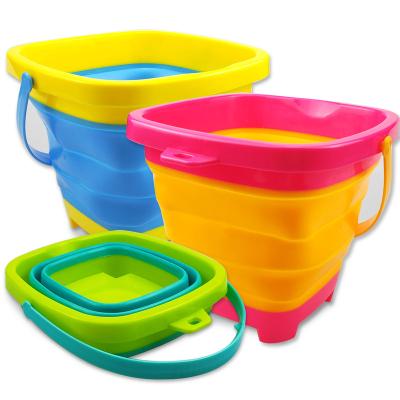 China YongnKids Summer Outdoor Play Silicone Sand Bucket Colorful Beach Toy Retractable Bucket for sale