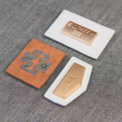 China Sustainable Jeans Accessories Printed PU Tags Custom Logo Design Emboss Custom Leather Metal Purse Leather Patch Label With Metal for sale