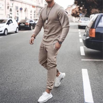 China Autumn New Men Solid Sports Tracksuit Casual 2 Piece Sets+Pants Fashion Viable Brand Jogger Set Long Sleeved T-shirt Sportswear for sale