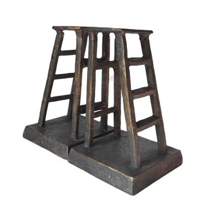 China Portable Metal Cast Iron Reading Book Stand Up Modern Bookends for sale