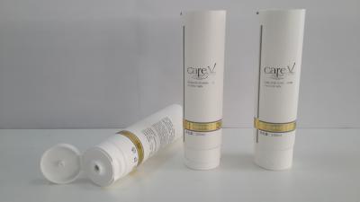 China Hot Stamping White Round Plastic Tubes , Laminated Cosmetic Tube With Screw On Flip On Cap for sale