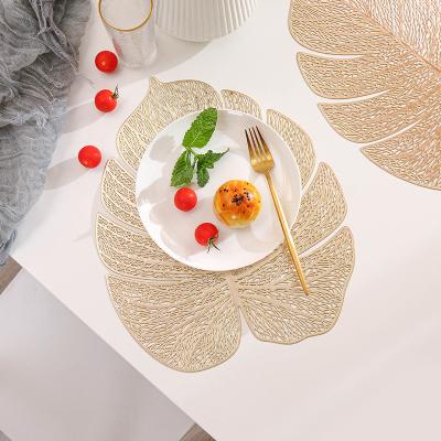 China PVC Viable Gold Place Mat For Dining Table Mat Creative Simulation Plant Hollow Sheet Place Mat Milk Coffee Cup Mats Home Decoration for sale