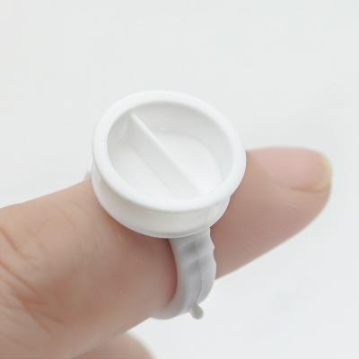 China Eyelash Extension Rings Hot New Shape Eyelash Glue Blue White Pink Holder With Long Eyelash Extension for sale