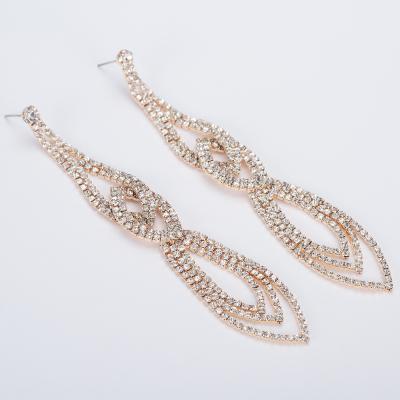 China FASHIONABLE luxury long water drop bridal exaggerated crystal earrings European and American brands pop earrings for sale