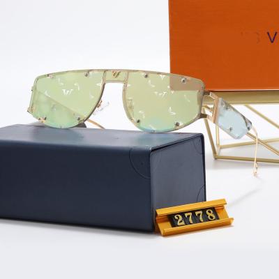 China Rectangle latest fashionable rectangular sunglasses with future y2k rivets style sunglasses for sale