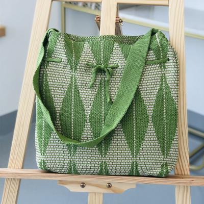 China Contrast Light Korean Wool Color Stripe Fashion INS Bucket Tote Bag Woven Shoulder Messenger Knitting Bag for sale