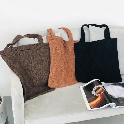 China 2021 autumn and winter new products light weight solid color wool knit bag inclined casual bag women's art shoulder handbag for sale