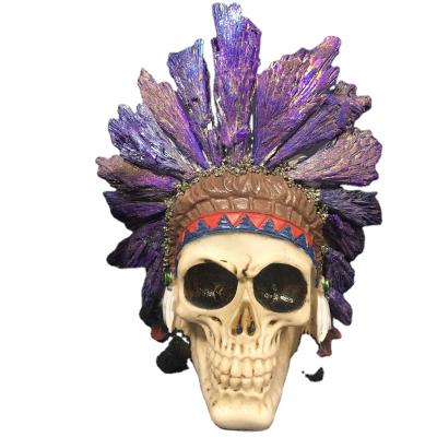 China Indian Resin Skull From China With Beautiful Natural Purple Tourmaline India Skull Helix Shaped For Decor for sale