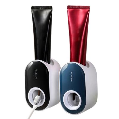 China Viable New Design Wall Mounted Plastic Automatic Toothpaste Dispenser Toothpaste Squeezer For Bathroom Accessories for sale