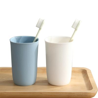 China 2021 Amazon Viable Hot Selling Mug Fashion Couples Toothbrush Brushing Home Plastic Mug Viable for sale