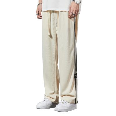 China Men's High Street Casual Pants Breathable Loose Straight Striped Long Pants Sports Drape Sweatpants for sale