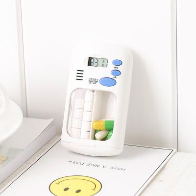 China Eco-friendly Weekly Storage Organizer Pill Reminder Box Pill Box Medicine Alarm Cases Plastic Organizer Timer Mini Portable Pill Reminder Box for sale