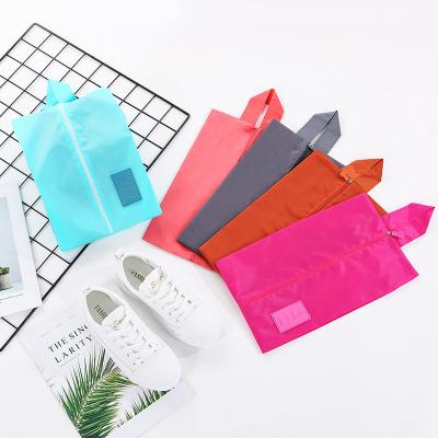 China Portable Hot Product Folding Pure Color With Convenient Pressure Design Plastic Folding Zipper Bag Storage Box for sale