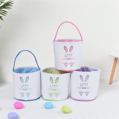 China New 2022 Viable Amazon Canvas Printing Easter Bunny Ears Decorative Gift Basket Sewing Bag for sale