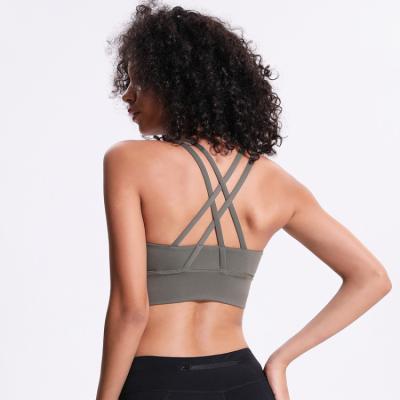 China Back Wholesales Breathable Gym Clothing Cross Straps Off Yoga Tank Top Fitness Women Bra for sale